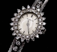 Auktion 356<br>Damen Armbanduhr Jaeger LeCoultre, WG 0.750 mit Diamanten, mechanisch, Werk läuft, Diamanten zus.ca. 1,80ct. ges. Gew. 28g.