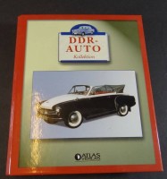 Auktion 335 / Los 12042 <br>4x DDR Kleintransporter etc., in oig. Display, mit Ordner "DDR Autos"