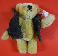 Auktion 353 / Los 12014 <br>Steiff-Teddy mit schwrazer Jacke, 2008, limitiert, H-10 cm