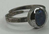 Auktion 344 / Los 1230 <br>offener Silberring-925- mit Opal, RG ca. 60, 2,8 gr., ungeputzt
