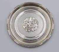 Auktion 346 / Los 11019 <br>Untersetzter, Georg Jensen, Nr. 41, 925er Silber, 31gr., D-8,2cm.