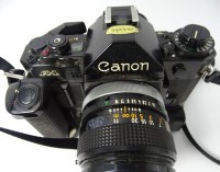 Auktion 346 / Los 16028 <br>Fotoapparat "Canon A 1" mit Winder, guter Zustand
