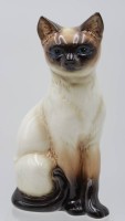 Auktion 348 / Los 9005 <br>sitzende Siam-Katze, Goebel, Nr. 3888, Unterglasurbemalung, H-28cm.