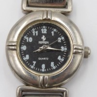 Auktion 348 / Los 2105 <br>Damen-Armbanduhr, Ferrari, Quarzwerk läuft, Tragespuren, D-2,3cm.