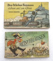 Auktion 349 / Los 3000 <br>2x Reisebücher um 1933, Der kleine Franzose und Münchhausen, Paperback