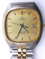 Auktion 349 / Los 2014 <br>Herrenarmbanduhr "Omega" Seamaster, Stahl/Gold, orig. Band, Quartz, Unterseite Logo und Nr. 770 in den Ecken, ca. 32x39,5 mm, Cal. 1430, guter Zustand