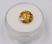 Auktion 351 / Los 1023 <br>orange champagnerfarbener Moissanite, ca. 4 ct, Zertifikat anbei