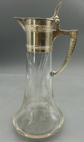 Auktion 352 / Los 10026 <br>Jugendstil-Weinkrug mit Schliff, versilberte Montur, "WMF" Glas oben eine Seite mit Spannungsriss, weder von innen noch von aussen fühlbar, H-32 cm