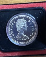 Auktion 352 / Los 6016 <br>Canada Dollar in Etui, boxed, stempelglanz, Winnipeg 1874-1974