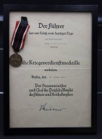 Auktion 352 / Los 7047 <br>Kriegsverdienstmedaille am Band mit Verleihungsurkunde, gerahmt, RG 32 x  23cm