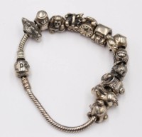 Auktion 353 / Los 1016 <br>Pandora-Armband mit 12 div. Charms, 925er Silber, 58,6gr., ca. L-18cm