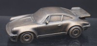 Auktion 353 / Los 15016 <br>Porsche-Modell, Bronze, H-6cm B-20,5cm