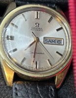 Auktion 353 / Los 2062 <br>Vintage OMEGA Seamaster Day Date Cal 752 Stahl Automatikuhr mit Goldhaube, Werk läuft,  Lederband, gut erhalten, in Schachtel, tw. überholt, Erhaltung Werk 1, Gehäuse 2