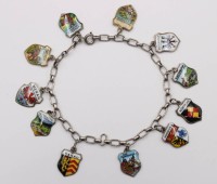 Auktion 353 / Los 1248 <br>Bettelarmband, Silber,  3x Charms versilbert, zus. ca. 12,9gr.