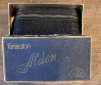 Auktion 353 / Los 16028 <br>Opernglas "Rodenstock" Adlon in orig. Karton und Tasche