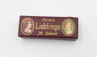 Auktion 356 / Los 16004 <br>Mundharmonika, Unsere Lieblinge, Hohner, orig. Pappetui