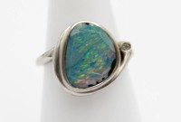 Auktion 357 / Los 1016 <br>925er Silber-Ring mit Opal, 3,5gr, Stein beschädigt, RG 56