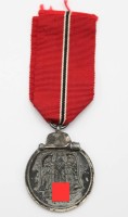 Auktion 357 / Los 7024 <br>Winterschlacht-Medaille am Band, 3. Reich, Altersspuren