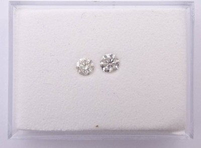 Auktion <br>Zwei Brillanten zus. 0,85ct., SI/ I, getönt, 0,34+0,41ct. [1]