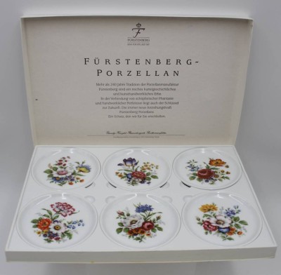 Auktion <br>6x Untersetzer, Fürstenberg, florale Dekore, orig. Karton, ca. D-10cm. [1]