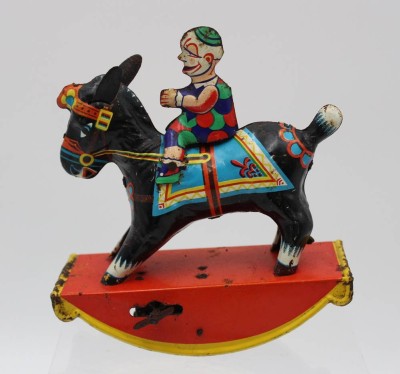 Auktion <br>Blechspielzeug, älter, GAMA, Clown auf Pferd,. Schlüsselwerk defekt, H-15,5cm B-14,2cm, Altersspuren [1]