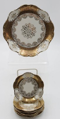 Auktion <br>7tlg. Konfektset, Winterling, Golddekor, ca. D-19 u. 11cm. [1]