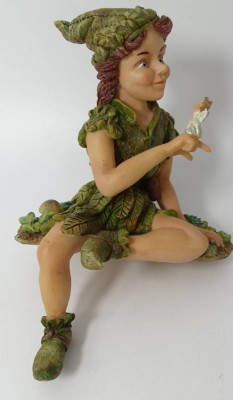 Auktion 345<br>Peter Pan Sitzfigur, bemalt, sign. TPG 2001, H-15 cm [1]