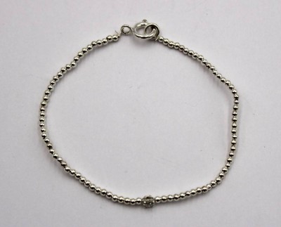Auktion 349<br>925er Silber-Armband mit kl. Diamant (0,14ct), zus. 3,1gr., ca. D-7,5cm [1]
