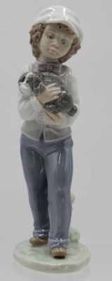 Auktion 351<br>Figur, Junge mit Hund, NAO Spain, Unterglasurfarben, H-20cm. [1]