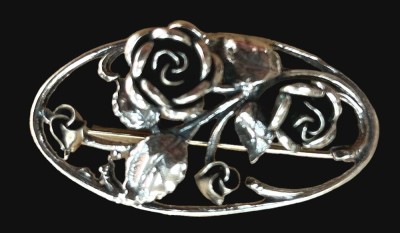 Auktion 349<br>ovale Silberbrosche-925-, Durchbruch-Rosen, 4,2x2 cm, 8,2 gr. [1]