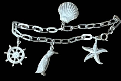 Auktion 349<br>Silber-835- Armband mit 4 maritimen Anhängern, L-ca. 18 cm, 8,1 gr. [1]