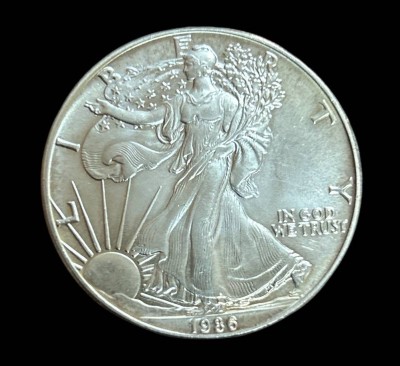 Auktion 351<br>Silberdollar 1986, USA, eine Unze Feinsilber, 31,4 gr., D-4 cm [1]