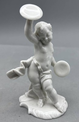 Auktion 353<br>Nymphenburg Figur, Junge mit Handzimbeln, Entwurf Bustelle, weiss, H-13 cm [1]