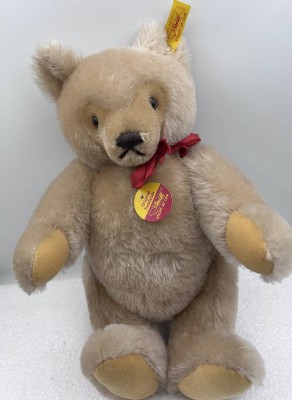 Auktion 354<br>Steiff Teddy, bllond mit roter Schleife, komplett, H-32 cm [1]