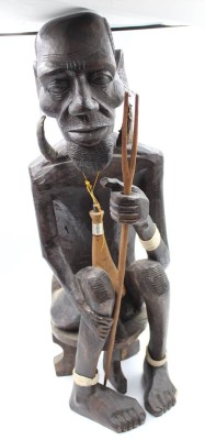 Auktion 355<br>gr. Holzfigur, Afrika, Krieger auf Hocker, älter, 1x am Fuss beschädigt, am Rücken Spannungsrisse, ca. H-77cm [1]