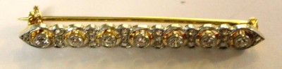 Auktion 355<br>750er GG Brosche mit 7 Brillanten (zus. ca. 0,7ct), ca. 4gr., L-4,5cm [1]