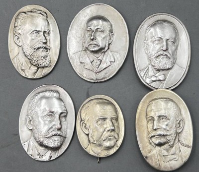 Auktion 356<br>Karl WASCHMANN (1848-1905) ,6x ovale Herren-Portrait-Plaketten, versilbert, einige signiert C. Waschmann, versilbert. max. ca. 6x4 cm [1]